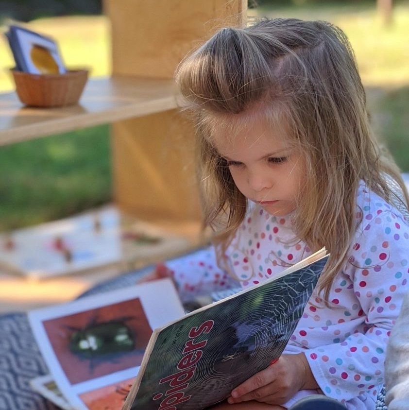 Toddler Outdoor Reading, The Montessori Academy of Arlington, Private School Arlington TX